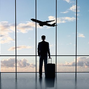 man at airport travelling